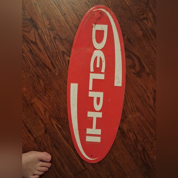 Delphi metal sign still has original plastic on front - Picture 2 of 2